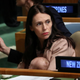 Ardern holds her baby.